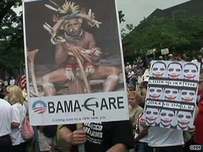 art.obama.protest.sign.cnn