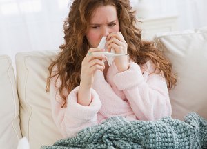 female-suffering-from-a-cold-flu-pic-getty-images-544468555